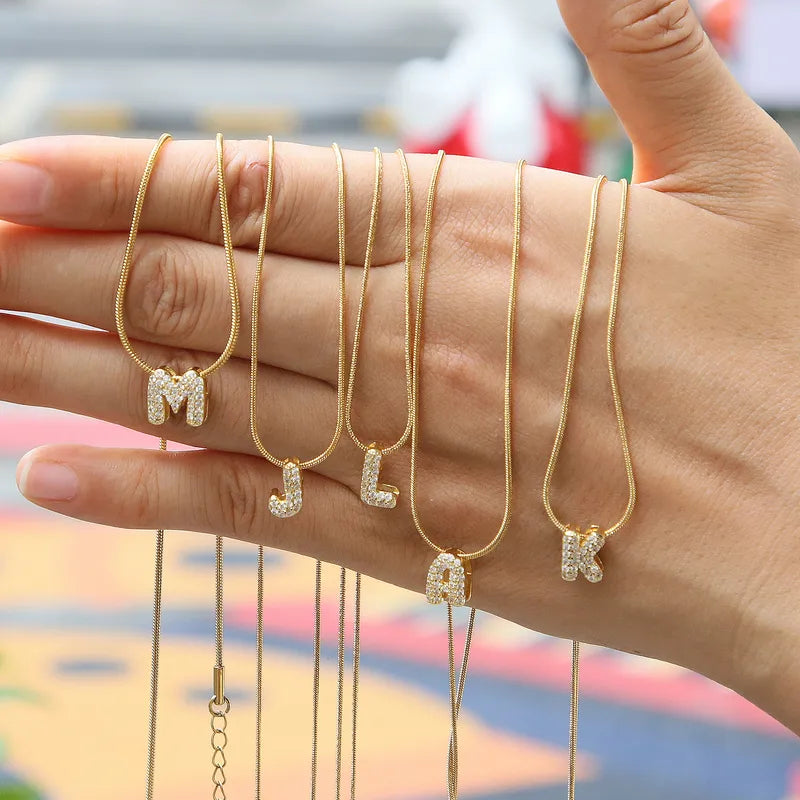 Mini Bubble Crystal Filled Gold Initial Necklace1